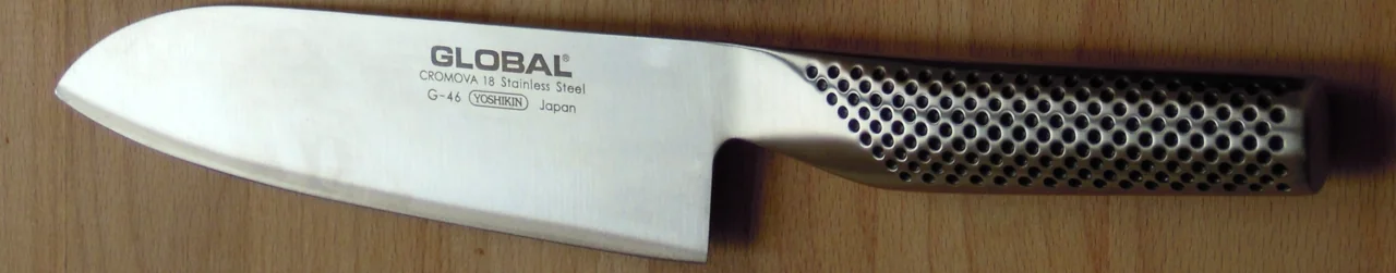 GLOBAL G-46 santoku knife with the G-46 model marking visible; isolated by cropping a multi-knife photograph
