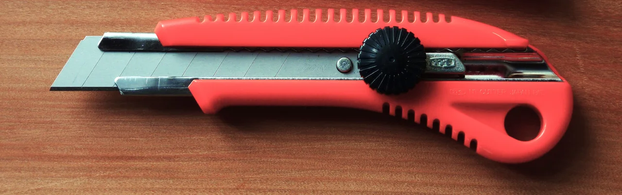NT Large Cutter; NT tool cropped from a two-tool photograph; the blister pack and spare blades are not shown.