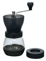 Original black HARIO Skerton manual coffee mill with glass grounds container and separate storage lid
