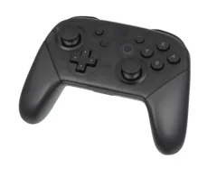 Original black Nintendo Switch Pro Controller viewed from the front-left; cable not pictured